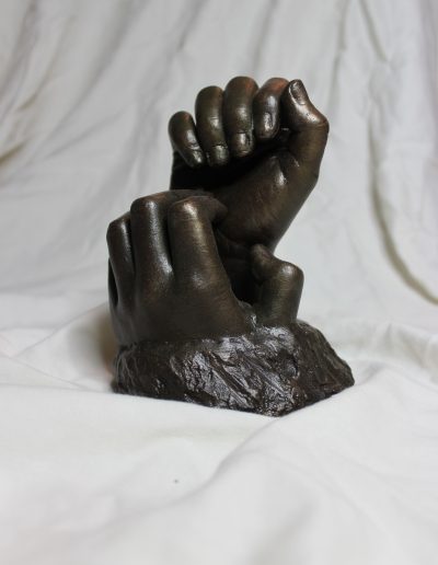 Carved Hydrostone with Cold Cast Bronze of Child's two hands together