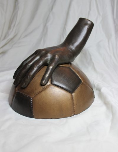 Hydrostone and Cold Cast Bronze Cast of both Soccer Ball and Hand merged together